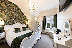 Superior king bedroom with TV and dressing table